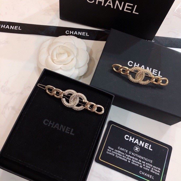 Ch*el brooches